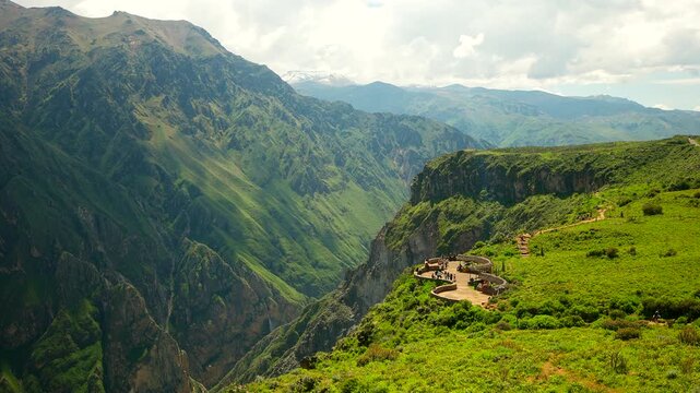 Scenic Cruz del Condor viewpoint overlooking lush Colca canyon in Southern Peru