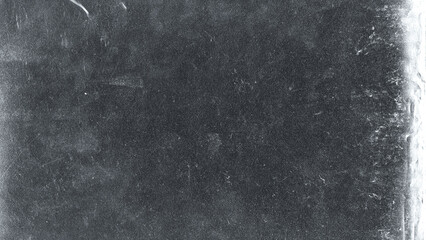 Fototapeta premium Plastic wrap texture overlay effect on black background. Shrink wrapped plastic sleeve for cover
