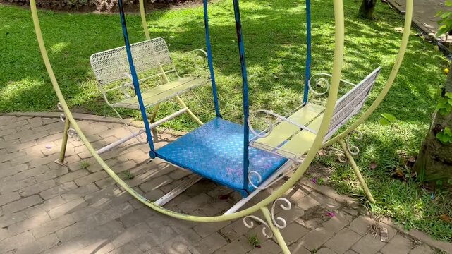 Empty Swing Ride in Calm Recreational Park