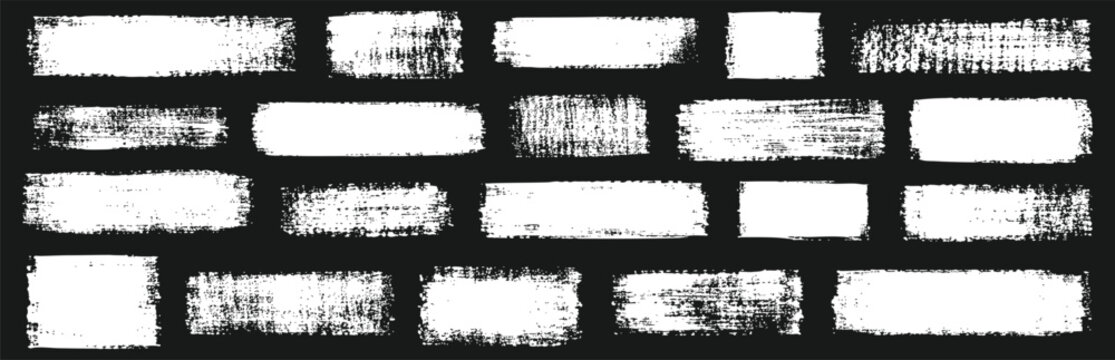 Set of grunge white rectangular brush strokes on black background distressed paint textures for design elements, frames, and banners