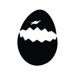 Silhouette of a baby bird hatching from an egg, black and white vector illustration design, easter egg cracking open silhouette vector illustration © hamiduls11arts