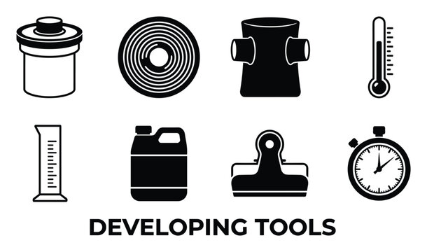 Developing tools for film photography light meter developing tank thermometer film reel measuring cylinder.