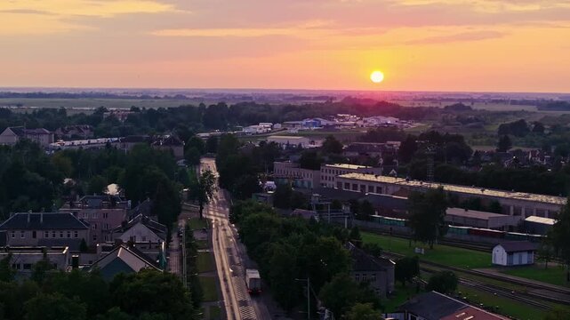Drone captures Kybartai border town atmosphere near Russian frontier at sunset.