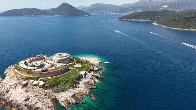 Aerial View of Mamula Island and Boats Sailing Into Kotor Bay, Montenegro, Drone Shot