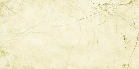 Fototapeta premium Vintage beige cracked paper texture background with green undertones for design