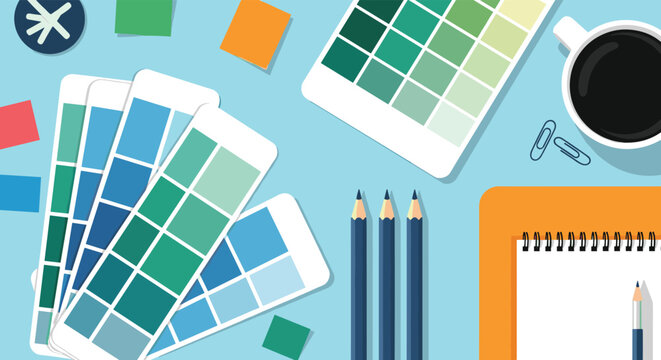 Top view of a creative designer workspace with color swatches coffee pencils and a notepad on a blue background.