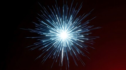 Fototapeta premium Bright blue firework explosion against dark red sky celebration display
