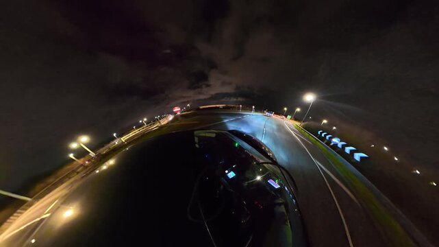 Night Drive on Highways. Car Mounted Camera Footage of Illuminated British Road Travel and Traffic During Night Drive on Motorways and Highways of England United Kingdom
