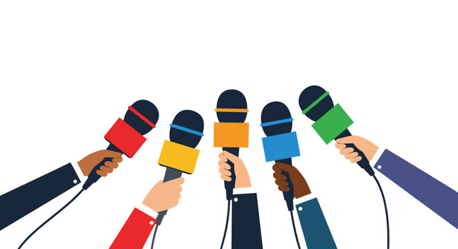 Multiple hands holding up professional microphones with colorful cubes during a busy media press conference event.
