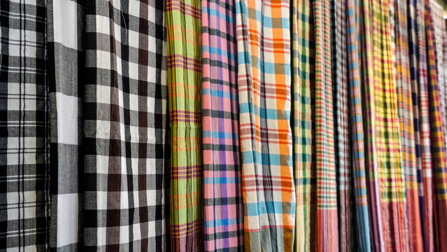 Colorful Thai loincloths with traditional checkered patterns