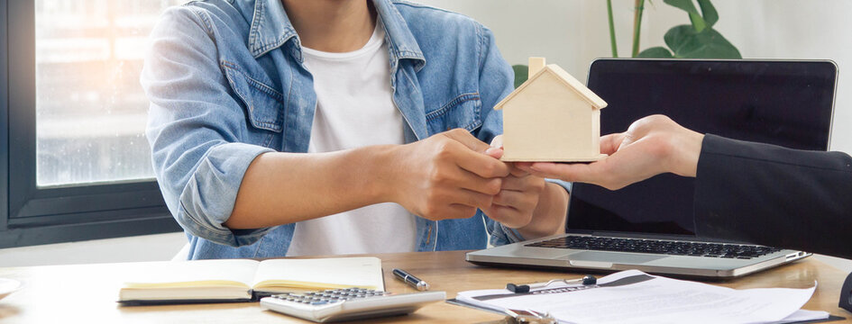 Landlord agent giving house property to new tenant after lease is confirmed
