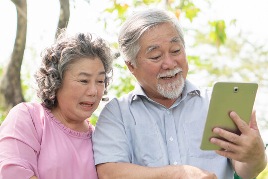elderly couple use device to communication with his family