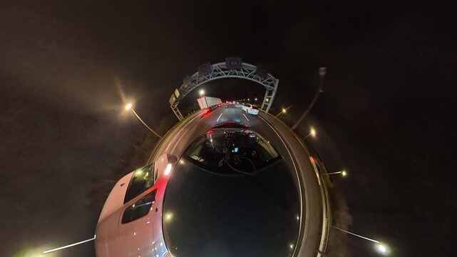 Night Drive on Highways. Car Mounted Camera Footage of Illuminated British Road Travel and Traffic During Night Drive on Motorways and Highways of England United Kingdom