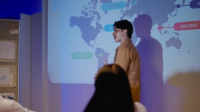Asian Business speaker giving a talk at business conference event.Business man,seminar success and applause with tablet and screen,stats and ppt,marketing statistics,infographic and team support.