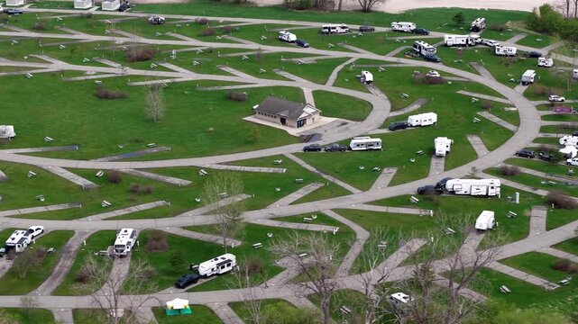 Aerial view of RV park campground with motorhomes