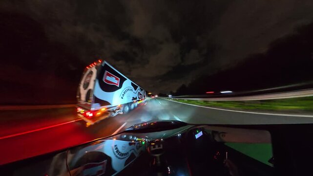 Night Drive on Highways. Car Mounted Camera Footage of Illuminated British Road Travel and Traffic During Night Drive on Motorways and Highways of England United Kingdom