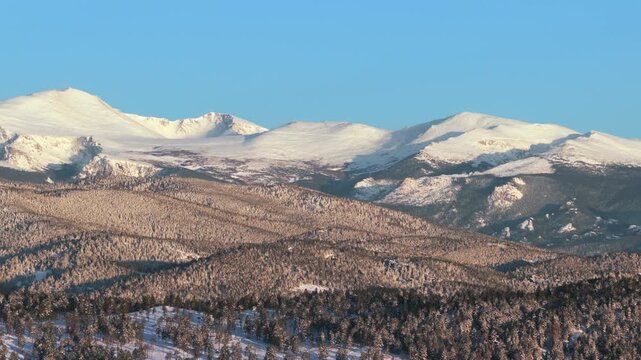 Mount Blue Sky Mt Evans wilderness landscape Evergreen Colorado aerial drone morning sunrise spring winter fresh snow Front Range Rocky Mountains Conifer Evergreen Meadows Marshdale Park pan left