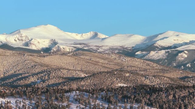 Mount Blue Sky Mt Evans wilderness landscape Evergreen Colorado aerial drone forwards spring morning sunrise winter fresh snow Front Range Rocky Mountains Conifer Evergreen Meadows Marshdale Park