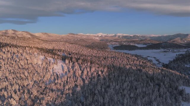 Neighborhood Evergreen Colorado aerial drone Conifer Evergreen Meadows Marshdale Park Mount Blue Sky Mt Evans wilderness morning sunrise spring winter snow Front Range Rocky Mountains right motion