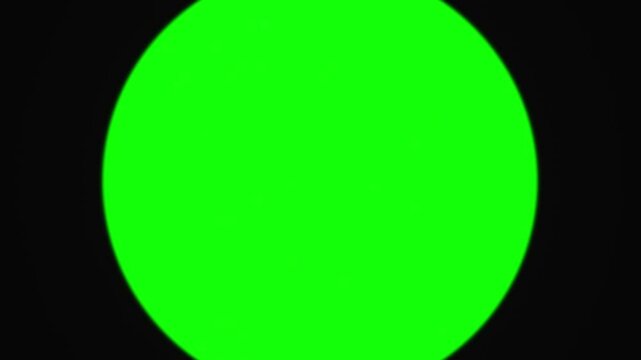 Zoom lens transition black round window on green screen reveal animation