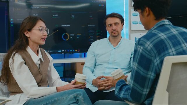 Diverse creative team use Ai Assistant (artificial intelligence assistant) on AI-assisted display for Marketing Data Analyst meeting at office.Coding team,develop Ai Assistant,business brainstorming