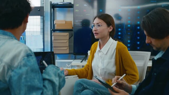 Diverse creative team use Ai Assistant (artificial intelligence assistant) on AI-assisted display for Marketing Data Analyst meeting at office.Coding team,develop Ai Assistant,business brainstorming