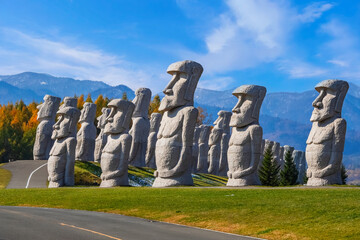Sapporo, Japan - October 30 2025: Makomanai Takino Cemetery is a vast greenspace features a collection of 40 Moai head, a Stonehenge replica and a giant Buddha statue.