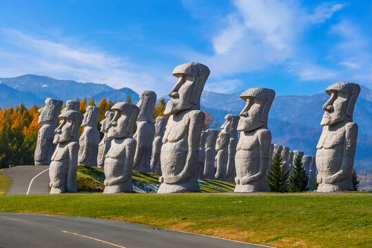 Sapporo, Japan - October 30 2025: Makomanai Takino Cemetery is a vast greenspace features a collection of 40 Moai head, a Stonehenge replica and a giant Buddha statue.