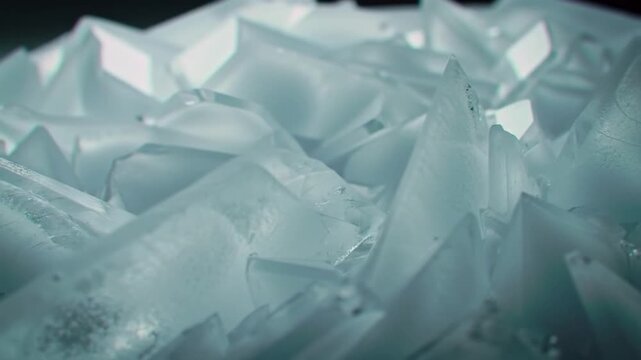 Macro close up of sharp jagged ice shards with cool blue lighting