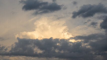 Fototapeta premium Dramatic Sky with Dark Clouds and Sunlight