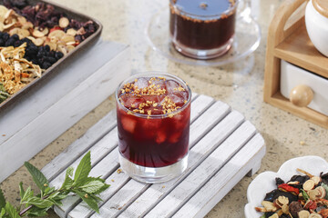 Traditional Chinese Herbal Tea with Plum Hawthorn Cinnamon and Umeboshi - Healthy Sour Soup Drink © TrinhVan