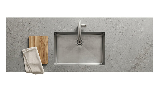 Top down view of concrete kitchen counter with modern steel sink faucet and wooden cutting board, with a grey linen fabric towel on countertop