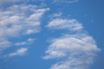 Fototapeta premium Natural background of blue sky and white clouds