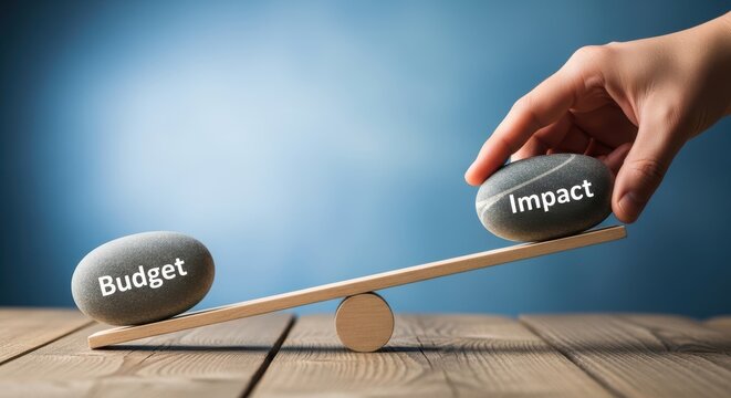 Conceptual of balancing budget and impact with stones on a seesaw
