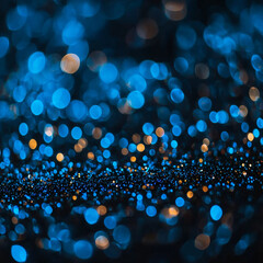 Fototapeta premium Abstract bokeh of blue and gold light orbs on a dark background, featuring a vibrant, concentrated line of tiny illuminated particles
