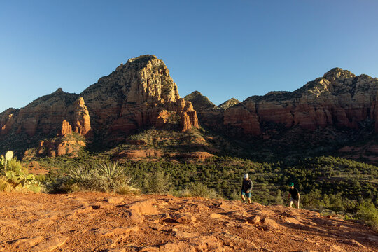 Two men hiking a scenic trail in Sedona