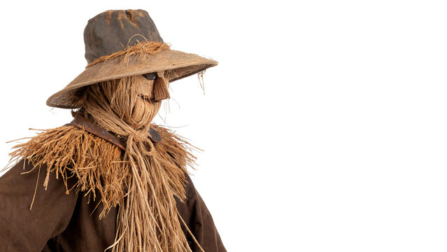 Scary Halloween scarecrow character wearing a vintage brown straw hat isolated on transparent background