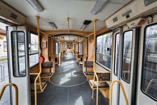 Empty tram at a stop, open door, interior view, XI. Budapest district, &Uacute;jbuda, Budapest, Hungary