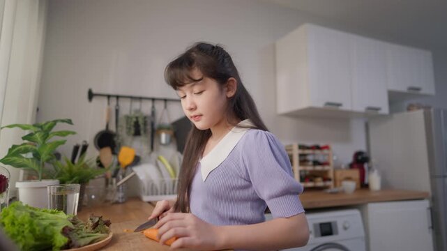 Asian young girl preparing food for breakfast in the kitchen at home. 