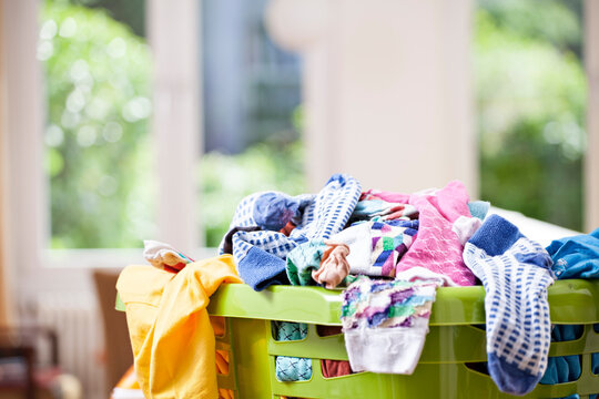 Germany, North Rhine Westphalia, Cologne, Clothes in laundry basket