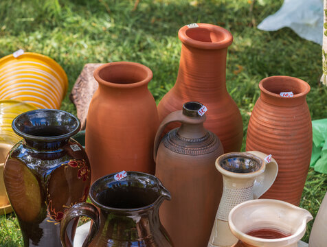 Various ceramic clay vases and pottery .