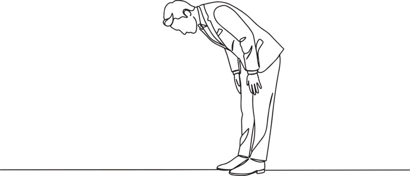 Man in a suit bowing deeply, showing respect and humility in a gesture.