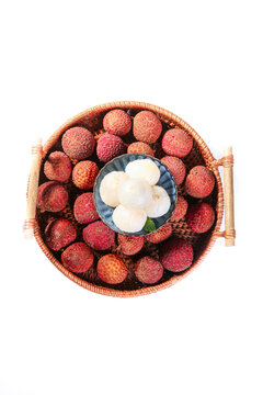 Fresh Hainan Lychee Fruits in Wicker Basket Still Life Showing Peeled Seeds and Healthy Tropical Mountain Produce