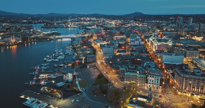 Aerial view of BC Legislative Parliament Building near harbor at night in Victoria, British Columbia, Canada	
