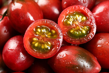 Fresh Red Tomatoes Cut in Half with Water Droplets Close-Up © PhamThi