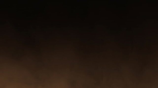 Fast moving brown sand dust storm and soil powder overlay on transparent background. Ideal for desert environment transitions or dramatic cinematic atmospheric effects.