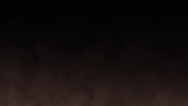 Fast moving cinematic brown sand dust storm and smoke overlay drifting up on transparent background. For cinematic visual effects in movie transitions and atmospheric scenes. 