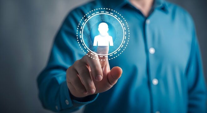 Person icon glowing on digital interface touched by a man's finger image