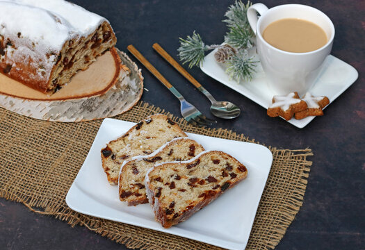 Slices of traditional German Christstollen with a cup of coffee.