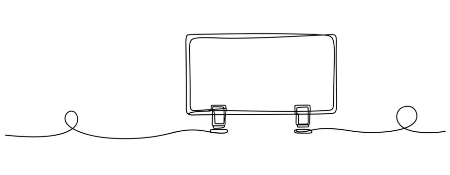 Computer monitor resting connected to cable on white desk. No editable stroke